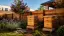 Backyard beehives positioned behind a privacy flyway barrier fence in a Dallas residential garden.