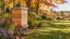 Illustrative wooden beehive in a spacious Ontario garden with autumn maple trees